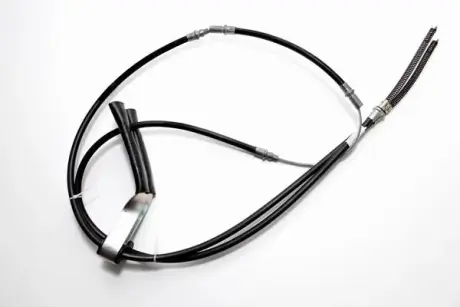 FORD Трос тормоза Transit 91- (twin wheels) (2730/2x940-231mm) CAVO 4602727