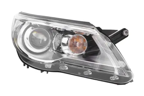 HELLA VW фара основна Bi- Xenon (з мотором, без газоразр.лампи D1S/H7 PY21W W5W прав. Tiguan 07- HELLA PAGID 1ZS009549221