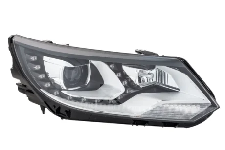 HELLA VW Основна фара прав. TIGUAN 07- HELLA PAGID 1ZS010748321