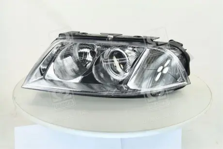 Фара лів. VW PASSAT B5 00-05 (вир-во) TYC 206244052B